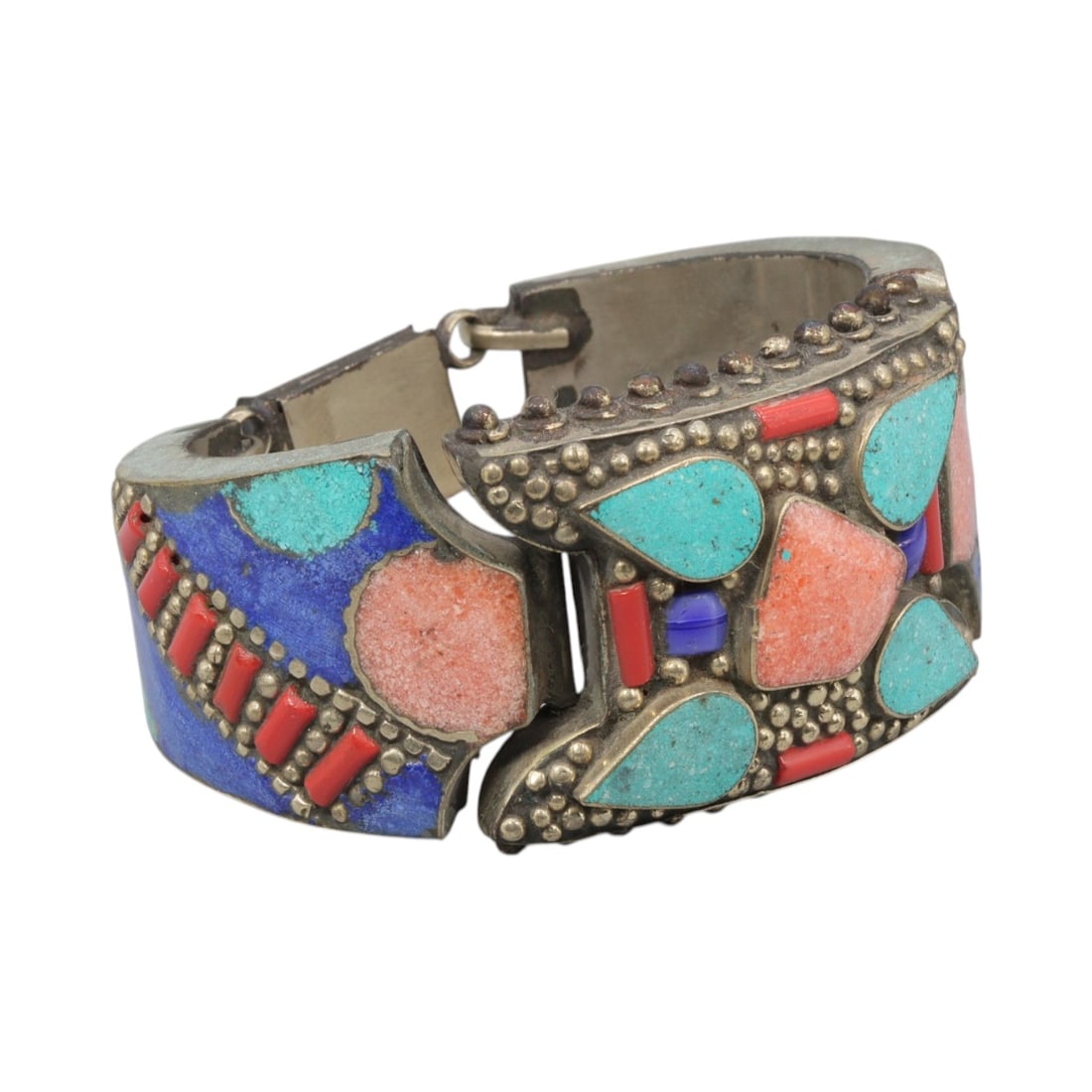 A Vintage Himalayan Silver-Plated Multi-Stone Inlay Hinged Bracelet, 34AH: A handcrafted vintage hinged bracelet, measuring approximately 6 cm in width, showcasing traditional Himalayan jewelry design. The piece features a silver-plated metal base adorned with elaborate mult