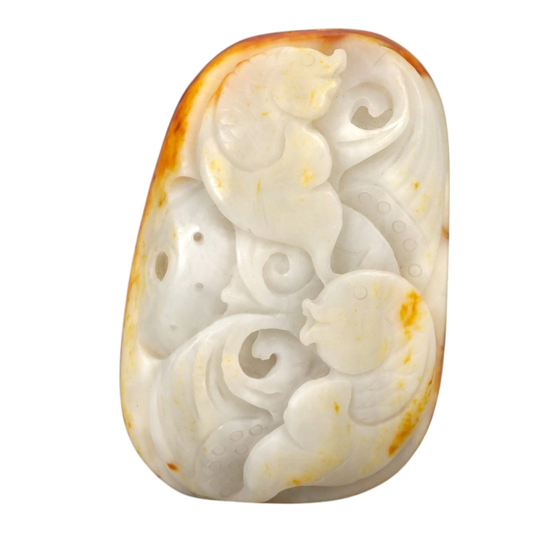 A Chinese Nephrite Jade Pebble with Fish Carvings, 20th Century, 22YB: Carved from a natural Hetian nephrite river pebble of creamy white tone with areas of warm russet skin preserved along the edges, the piece is worked in shallow relief while retaining the rounded, org