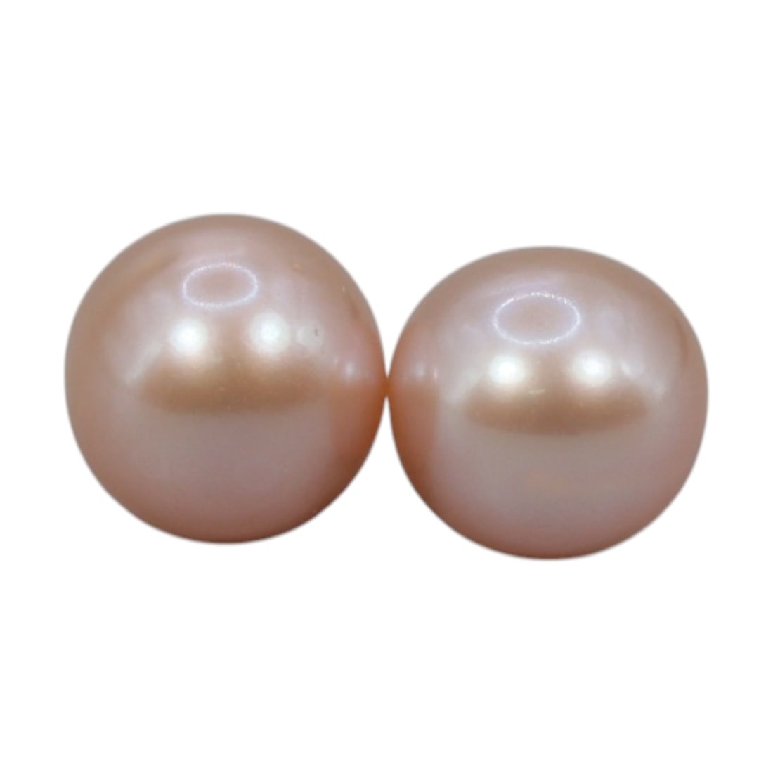 Freshwater Pearl Pair - Natural Pearl Peach Round Gemstones 7.1mm, 28XA: A matched pair of natural freshwater pearls, exhibiting a soft peach-pink hue with bright, even luster and subtle iridescent orient. The pearls are near-spherical, with smooth nacre and minor natural 