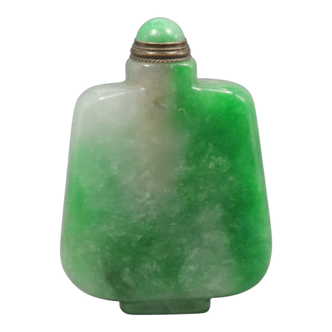 A Chinese Jadeite Jade Snuff Bottle, 20th Century, 27YC: The bottle is carved from jadeite jade with mottled green and pale white coloration, the stone displaying natural clouding and tonal transitions. It is formed with a flattened rectangular body with ro