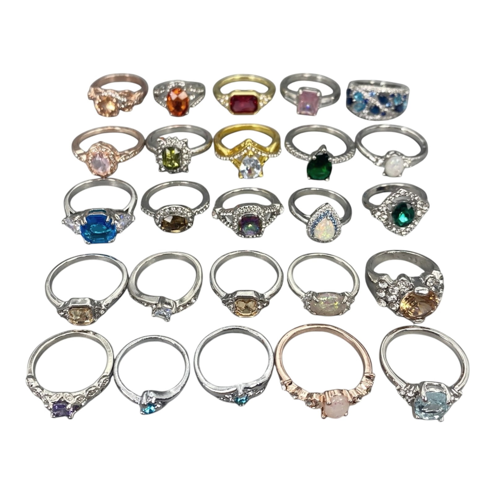 A Group of Modern Metal and Gem-Set Fashion Rings, Late 20th-Early 21st Century, 69XJ: Comprising twenty-five modern fashion rings constructed from mixed base metals and non-precious alloys, the group presents a wide range of contemporary designs set with synthetic, treated, or simulate