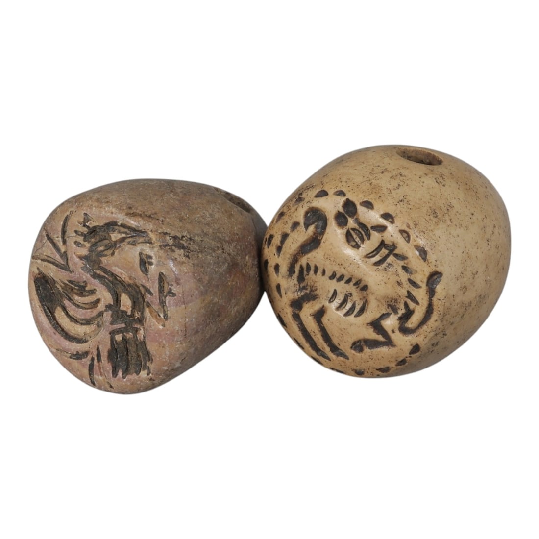Lot of 2 Ancient Near Eastern Stone Conoid Stamp Seals, c. Late Bronze Age, 69WM: Each seal is carved from stone, exhibiting natural color variations ranging from reddish-brown to light beige with surface patination consistent with age. The objects are of conoid form with a rounded
