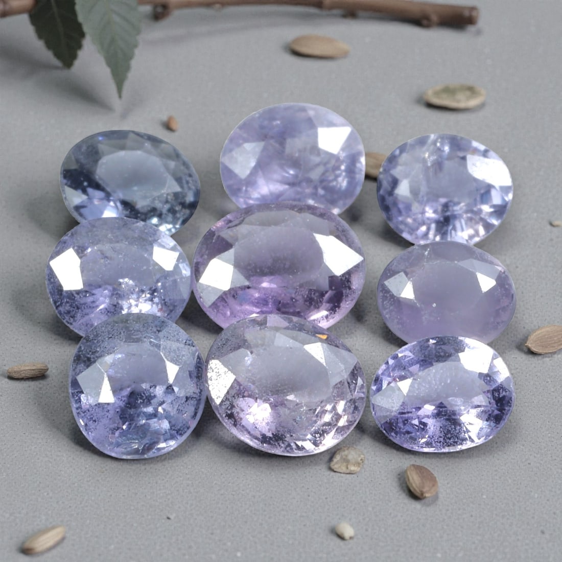 4.42 Carats Lavender Spinel Parcel - Natural Loose Stones, 48XP: This delicate parcel of spinel features a dreamy spectrum of lavender and soft violet hues, ranging from pale lilac to deeper, misty purple tones. The total carat weight of the lot is 4.42 carats, wit
