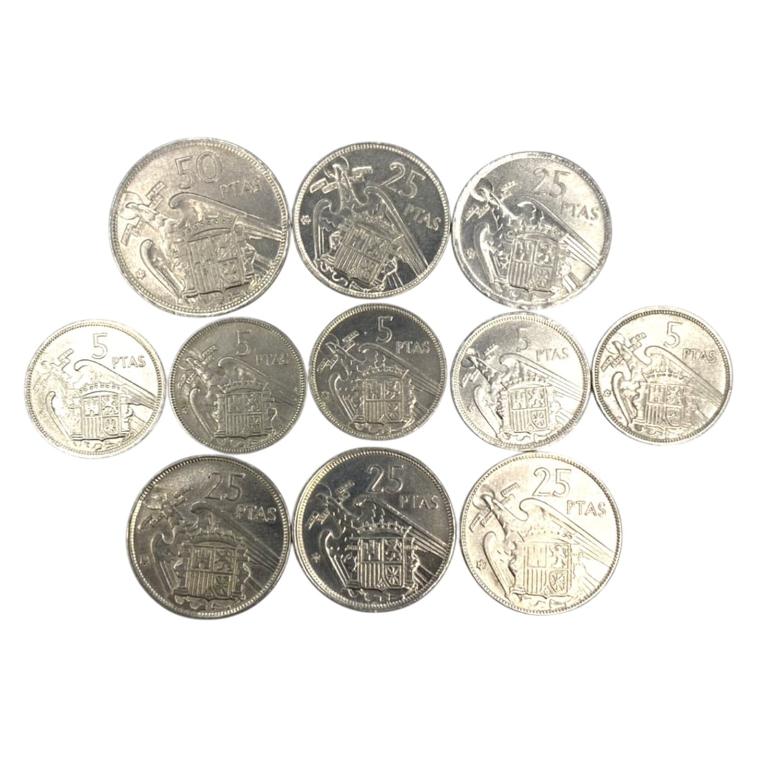 SPAIN: Franco Era Nationalist Coinage - 11-Piece Coins Set, 1953-1957, 23-30mm, 17ZJ: This 11-Piece Coins Set of Spanish Pesetas coins, minted between 1953 and 1957, encapsulates the nationalist identity of the Franco regime. Ranging from 23 to 30mm in diameter, the set features denomi