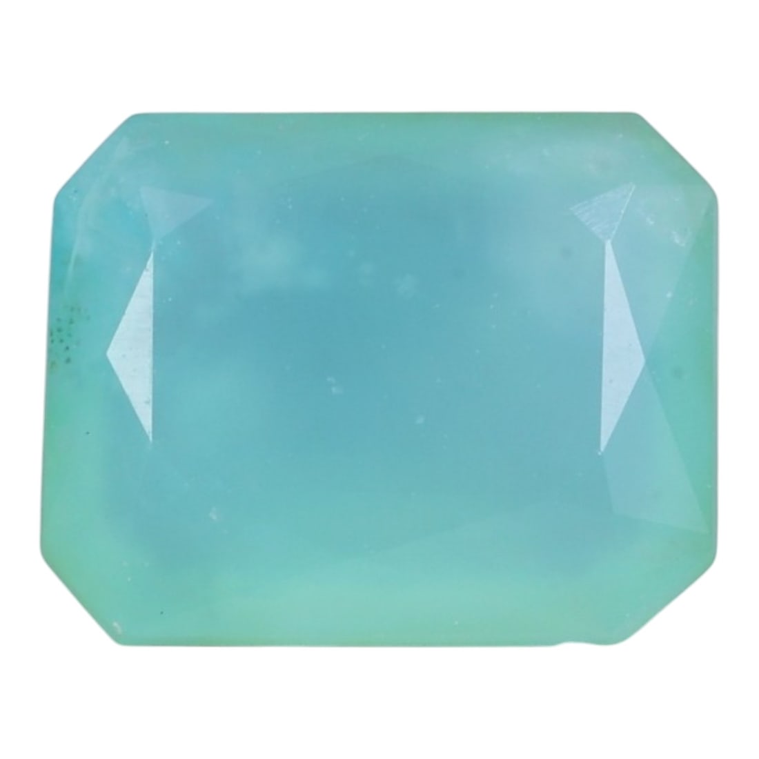 1.39 Carats Soft Aqua Peruvian Paraiba Opal Emerald Cut - Natural Stone, 88XY: This singular emerald-cut Peruvian Paraiba opal, measuring 8.9 x 7.1 x 3.5 mm, radiates with a serene, soft aqua hue reminiscent of calm tropical lagoons and misty skies. Its geometric emerald cut cre