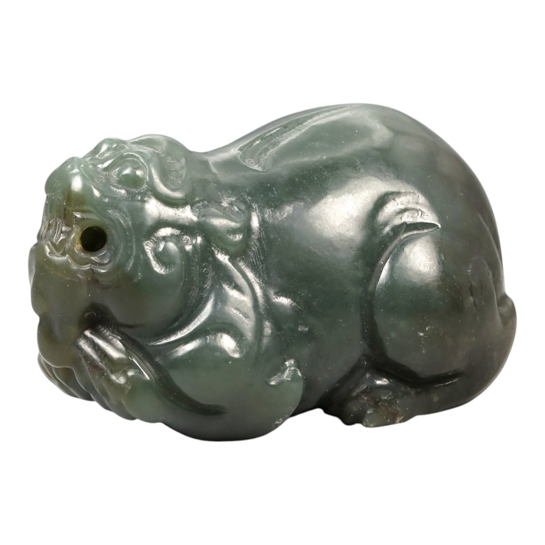 Chinese Jade Pixiu Beast - Carved Animal Figurine 5.3cm, 88ZC: Carved from green jade with natural tonal variation and semi-translucent areas, this sculptural figure represents a pixiu modeled in a compact recumbent posture. The carving is executed fully in the r