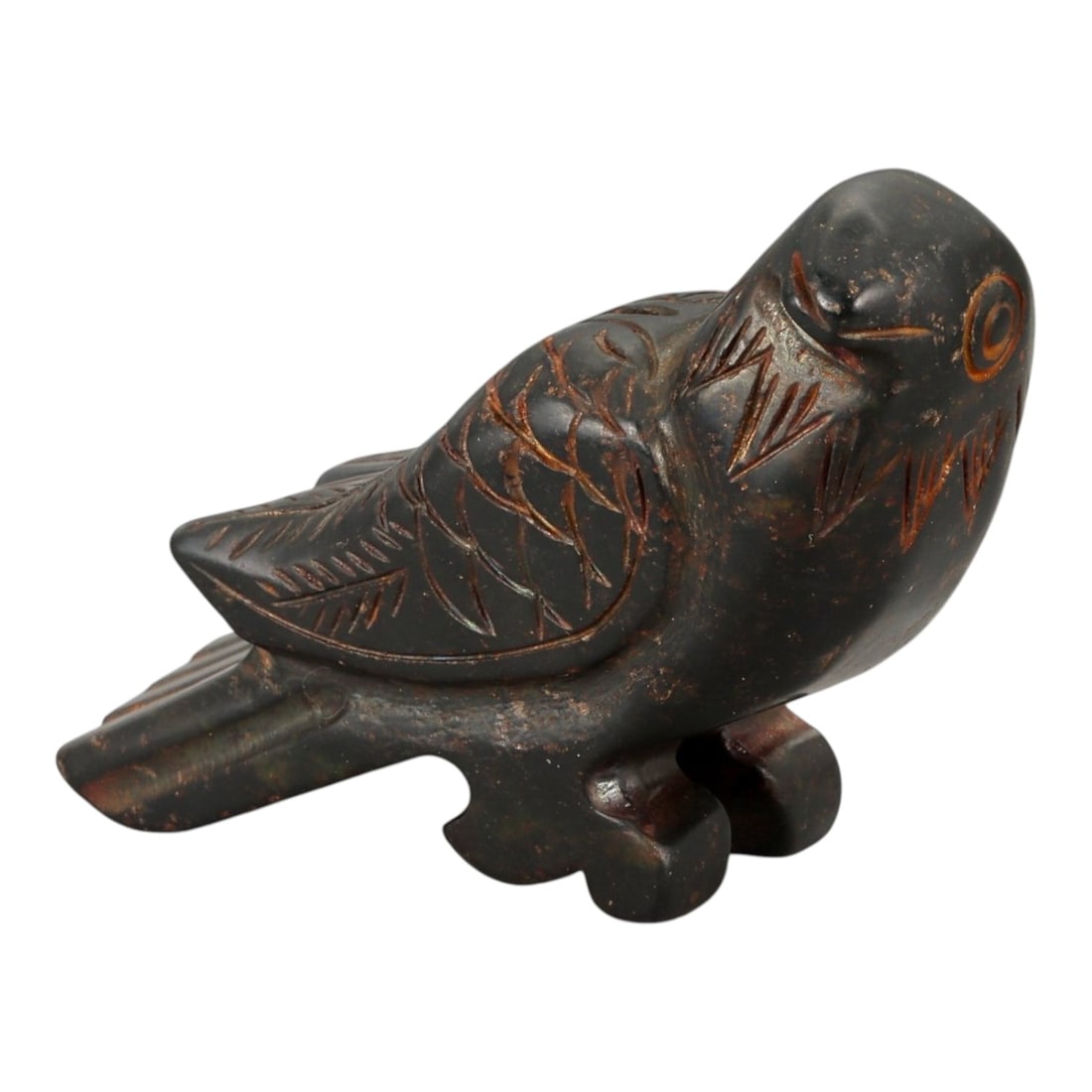 A Chinese Hardstone Bird Carving, 20th Century, 24YB: Carved from dark hardstone with a smooth, polished surface and scattered reddish-brown inclusions, the sculpture represents a stylized bird shown in a recumbent posture. The head is rendered with a ro