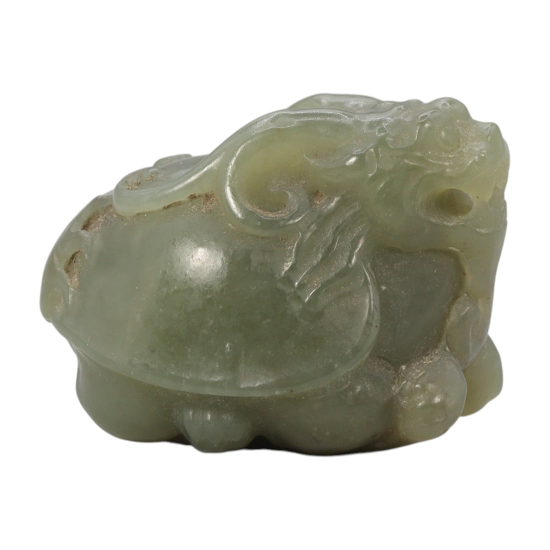 143 Carats Real Light Green Jade Dragon Turtle Figurine, 3YA: I've got a real nice little treasure here to show you , this hand-carved jade dragon turtle is just full of charm! This one's a solid, smooth piece weighing 143 carats, measuring 31x26x23mm. The color