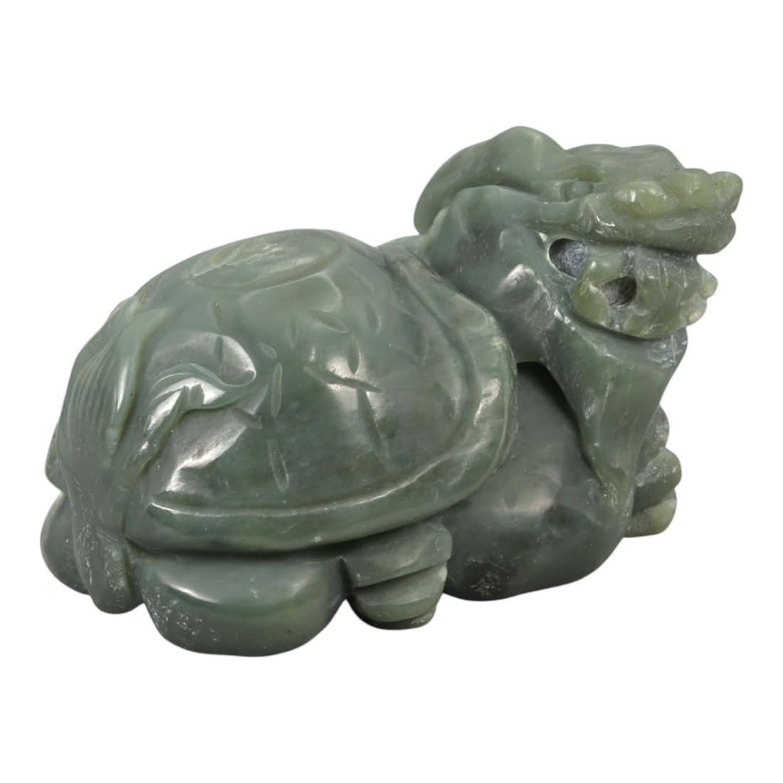 A Chinese Jade Dragon Turtle (Bixi) Sculpture, 20th Century, 88YA: Carved from green jade with areas of darker and lighter tonal variation and natural translucency, the sculpture represents a dragon turtle (bixi) modeled fully in the round. The creature is shown in a