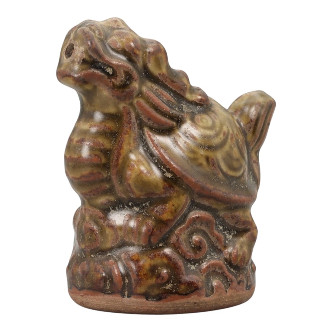 A Chinese Glazed Ceramic Bixi Figure, 20th Century, 78FG: Modeled from ceramic and covered with a mottled glaze in olive green, brown, and reddish tones, the figure represents bixi, the mythical creature combining the body of a tortoise with the head of a dr