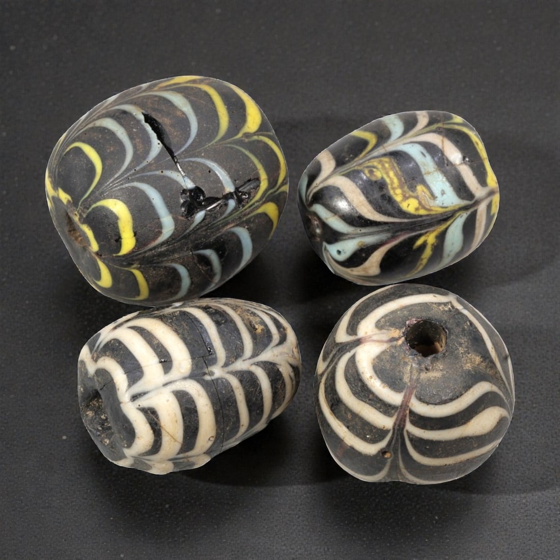 Lot of 4 Natural Islamic Feather-Patterned Glass Beads, Circa 9th-14th Century, 68AD (1 of 1)