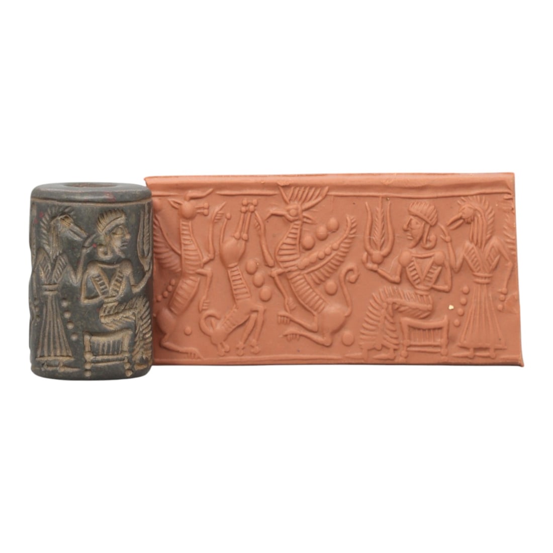 Ancient Steatite Cylinder Seal - Mesopotamian Mythological Procession & Deity Scene, 6ZP: Carved from dark, finely grained steatite, this ancient Mesopotamian cylinder seal depicts a rich mythological procession scene, executed with meticulous glyptic craftsmanship characteristic of the La
