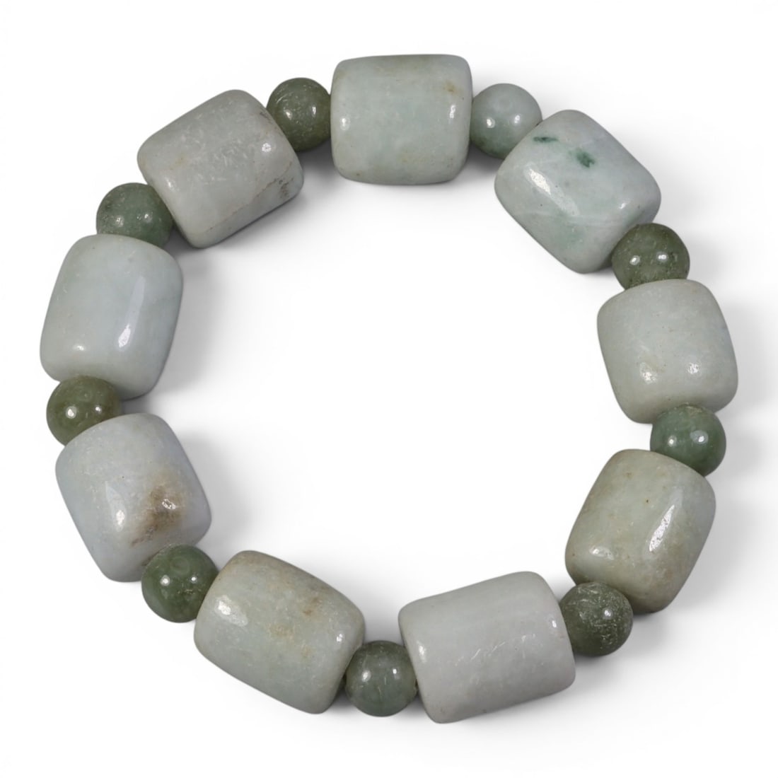 Natural Type A Burmese Jadeite Beaded Bracelet, 100AJ: Come take a look at this lovely Type A Burmese jadeite beaded bracelet, a simple yet timeless piece! This bracelet is made with alternating barrel-shaped and round jadeite beads, strung together to fo