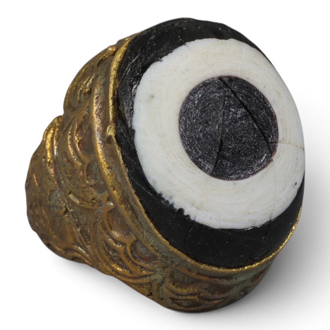 Antique Qajar Dynasty Gilt Evil Eye Ring, US Size 6.5, 51AJ: A gilt-metal ring of the Qajar period, US ring size 6.5, featuring a large domed evil-eye glass inlay with a bold concentric black-and-white design (the glass exhibits age-related cracks). The bezel a