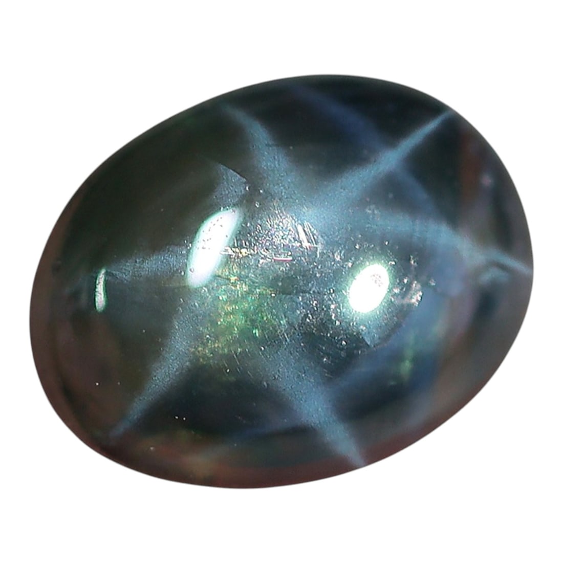 1.31 Carats Multi-Tone Star Sapphire Oval Cabochon - Natural Loose Gemstone, 39XC: This compact oval star sapphire presents a mesmerizing multi-tone display, with shifting hues of deep blue, subtle green, and soft grey tones that come alive under light. A bright, well-defined six-ra