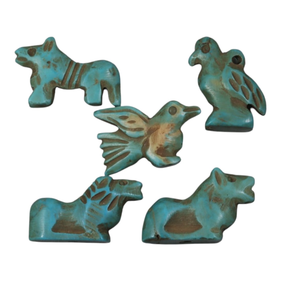 Lot of 5 Ancient Coptic Egyptian Turquoise Stone Zoomorphic Amulets, Roman to Coptic Era, 84WT: Carved from turquoise-hued stone, the group consists of five stylized zoomorphic amulets. The set includes two quadrupedal forms, possibly horses or felines, and three avian forms with incised feather
