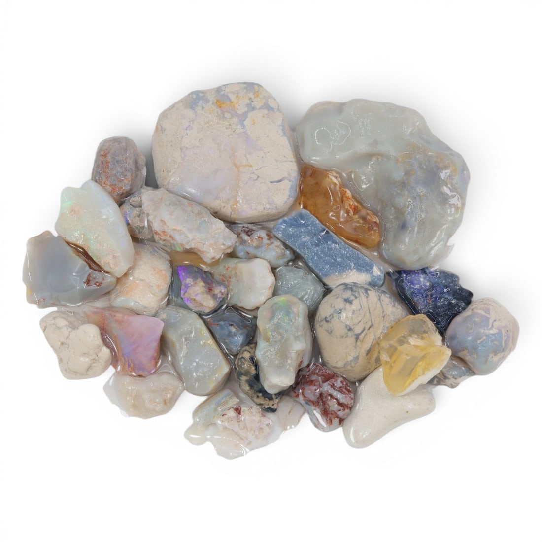 Natural Australian Lightning Ridge Opal Rough, 52g, 89WS: This collection of raw opal rough hails from Australia's legendary Lightning Ridge, showcasing the region's iconic play-of-color potential. The stones exhibit a range of natural hues, from milky white
