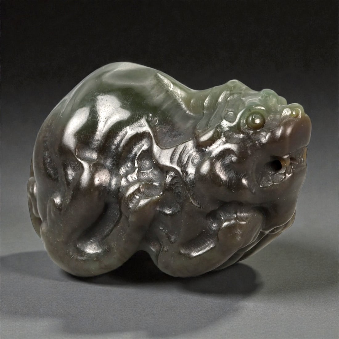 330 Carats Natural Hetian Nephrite Jade Pixiu Figurine, 87FA: I'm happy to present this stunning Hetian nephrite pixiu figurine, a true piece of hand-carved art right here! Look at that beautiful natural gradient, deep, rich chocolate brown that softens into lus