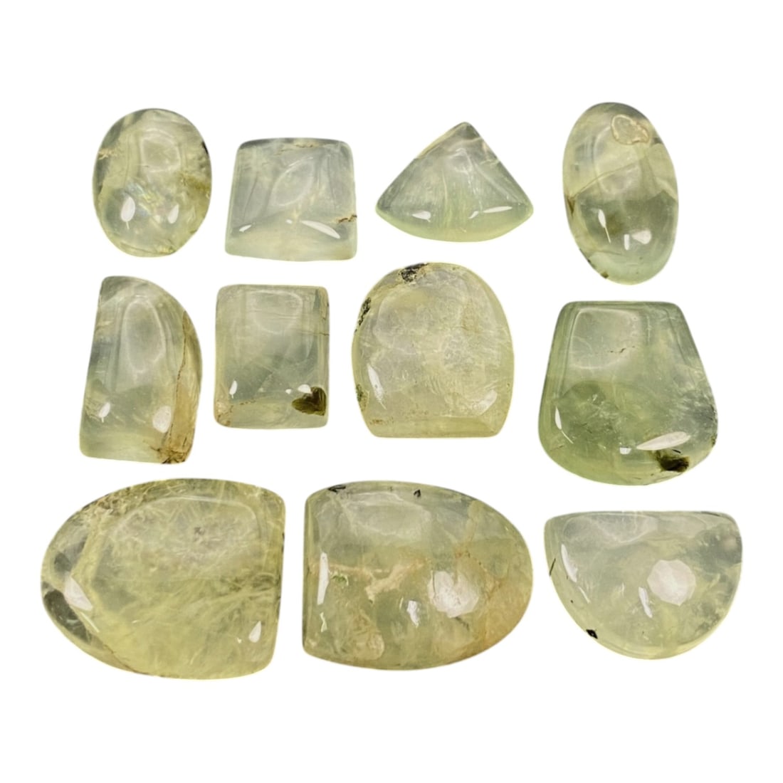 196 Carats Pale Green Prehnite Cabochon Parcel - Natural Malagasy Stones - 1.3-2.2cm, 69ZJ: This curated parcel of loose prehnite cabochons captivates with a soft, translucent pale green hue, each stone radiating a gentle, milky glow that evokes the quiet beauty of a forest stream. The inter