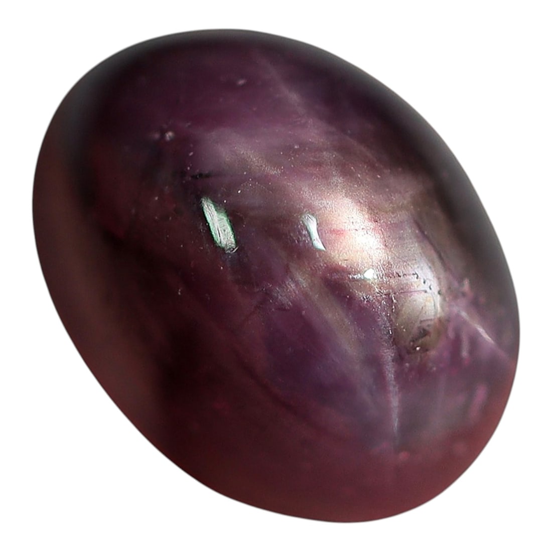 4.77 Carats Deep Magenta Star Ruby Oval Cabochon - Natural Loose Gemstone, 37XC: This striking star ruby displays a rich, saturated magenta hue that shifts between deep rose and vivid crimson under light, creating a dramatic backdrop for its distinct six-rayed star. The star's sof