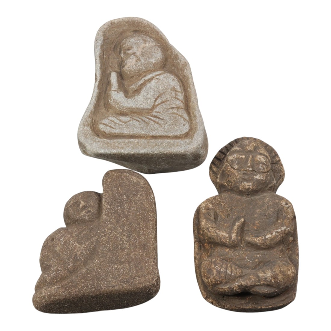 Lot of 3 Antique Japanese Edo Period Stone Buddhist Amulets, 24WT: Three carved stone Buddhist amulets of the Edo period, each depicting devotional figures in seated poses, worked from grey and brown stone with weathered patina and surface wear. The group includes a 