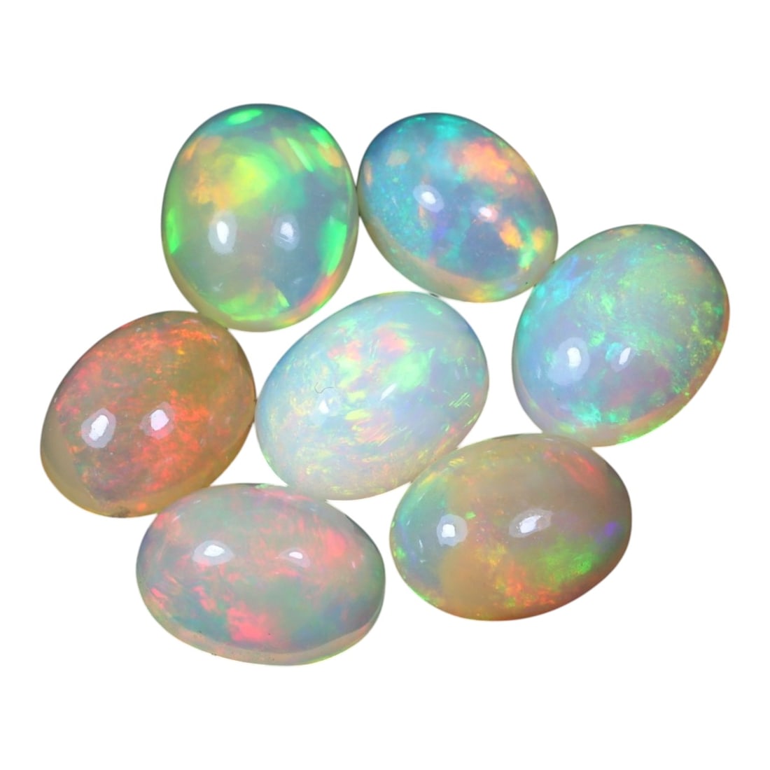 8.21 Carats Multicolor Welo Opal Oval Cabochon Parcel - Natural Ethiopian Stones, 55XC: This luminous parcel of Ethiopian Welo opals presents a breathtaking display of shifting iridescence, showcasing vivid greens, electric blues, fiery oranges, and soft pinks across each smooth, polishe