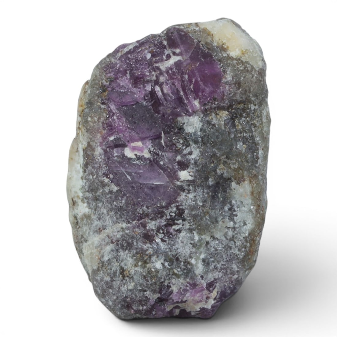 28.33ct Natural Mauritania Ruby Rough (Unheated), 75XA: This unheated Mauritania ruby rough is a captivating natural crystal specimen, featuring vivid magenta-purple ruby formations embedded in a contrasting greyish matrix. The stone's rugged, unpolished s