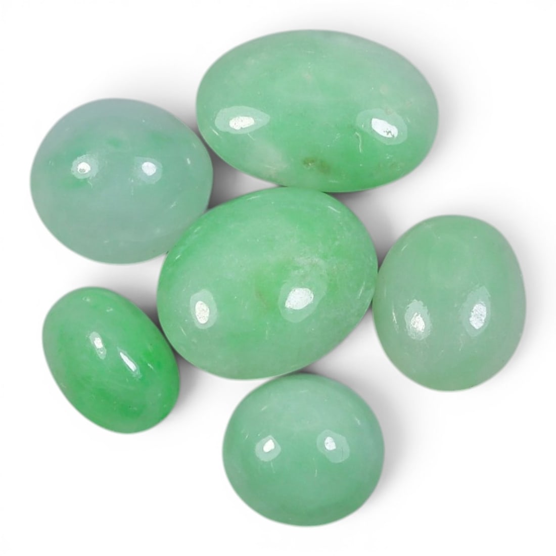 17.19 Carats Natural Type A Burmese Jadeite Cabochon Lot, 95AJ: Come take a look at this lovely little collection of six natural jadeite cabochons, each one with its own sweet green personality! Look at the range of soft, springtime hues here-from pale mint green 