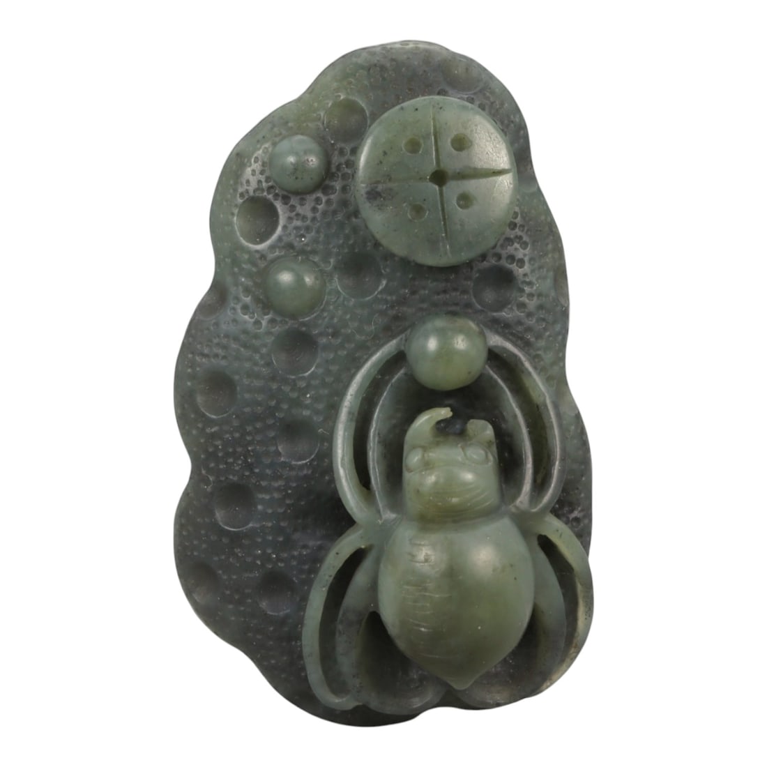 A Chinese Jade Spider Plaque, 20th Century, 13FB: Carved from translucent green jade with darker mottling and natural inclusions, the plaque is worked in low relief with a spider shown frontally, its rounded abdomen and segmented body rendered with s