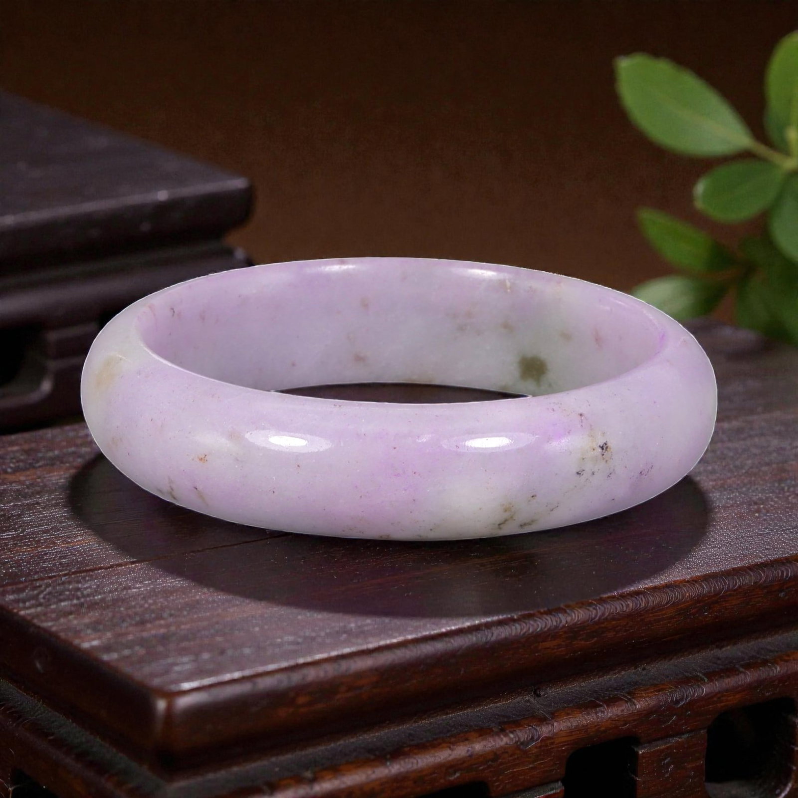 Natural Burmese Type A Lavender Jadeite Bangle - Soft Lilac Bracelet, 16EA: This is a wide, solid bangle crafted from natural Burmese Type A jadeite, displaying a soft lavender to lilac base with subtle natural inclusions and faint green accents throughout the polished stone.