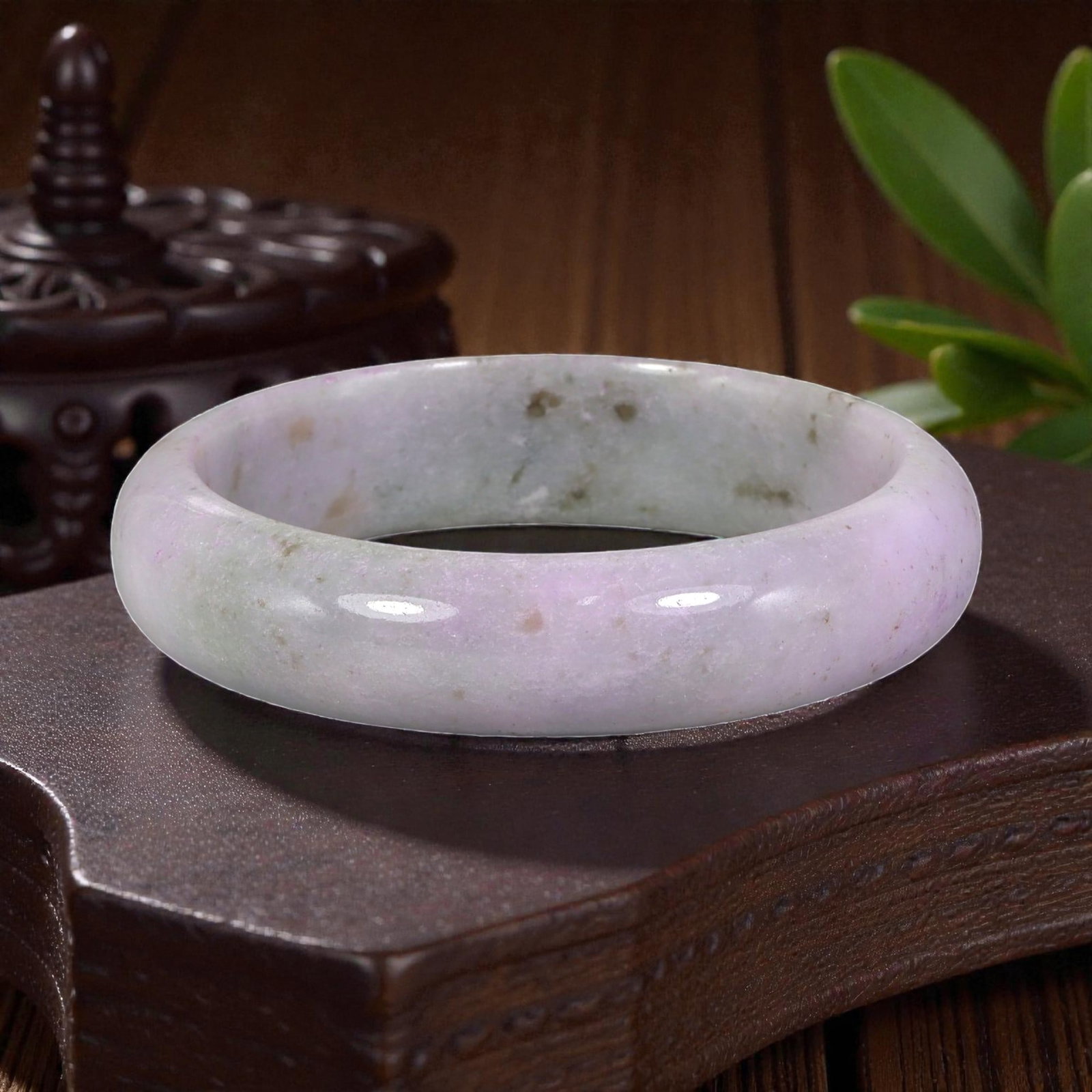 Natural Burmese Type A Lavender & Green Jadeite Bangle - Soft Watercolor Bracelet, 89XE: This is a wide, solid bangle crafted from natural Burmese Type A jadeite, displaying a soft lavender base with delicate green watercolor-style patterning and subtle earthy flecks throughout the polish