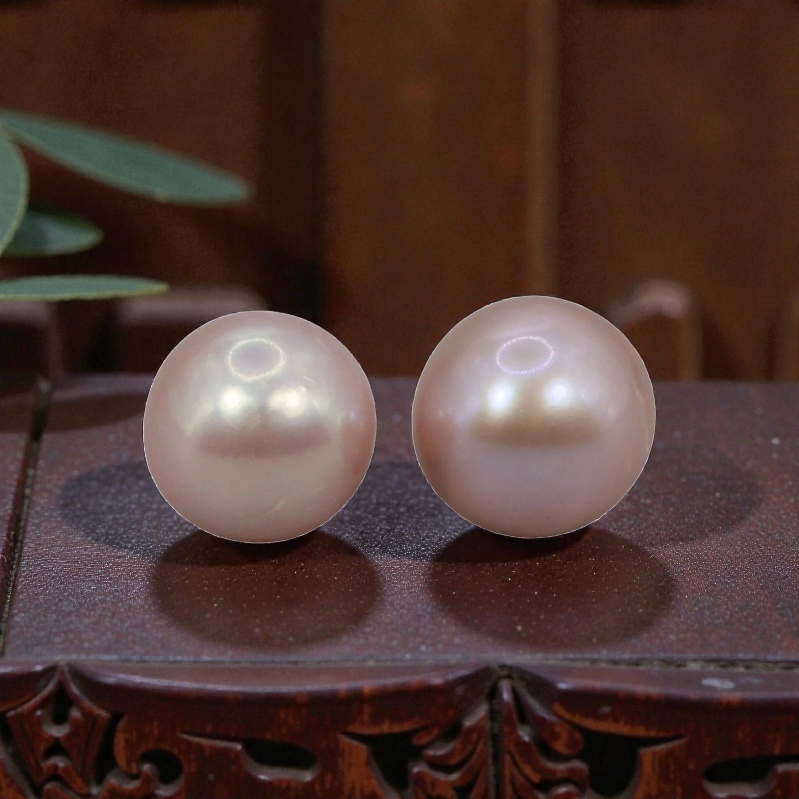 Freshwater Pearl Pair - Natural Pearl Pink Round Gemstones 7.3mm, 17XA: A matched pair of natural freshwater pearls, exhibiting a soft pinkish-peach hue with bright, even luster and subtle iridescent orient. The pearls are near-spherical, with smooth nacre and minor natur