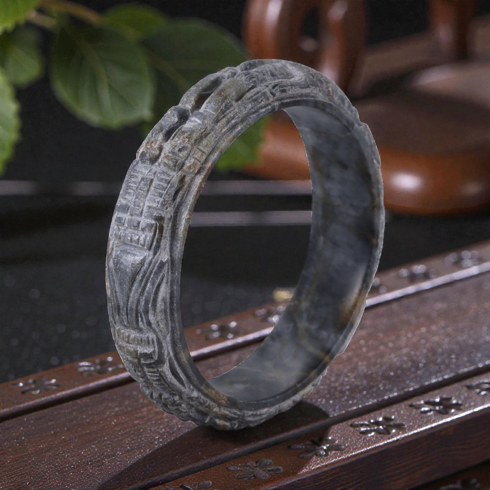 Jadeite Jade Dragon Bracelet - Carved Asian Bangle, 6.3cm Inner Diameter, 21WE: Carved from dense grey-green jadeite, this bracelet is formed as a continuous circular bangle with sculptural relief carving along the exterior surface. The stone has been hollowed and shaped through 
