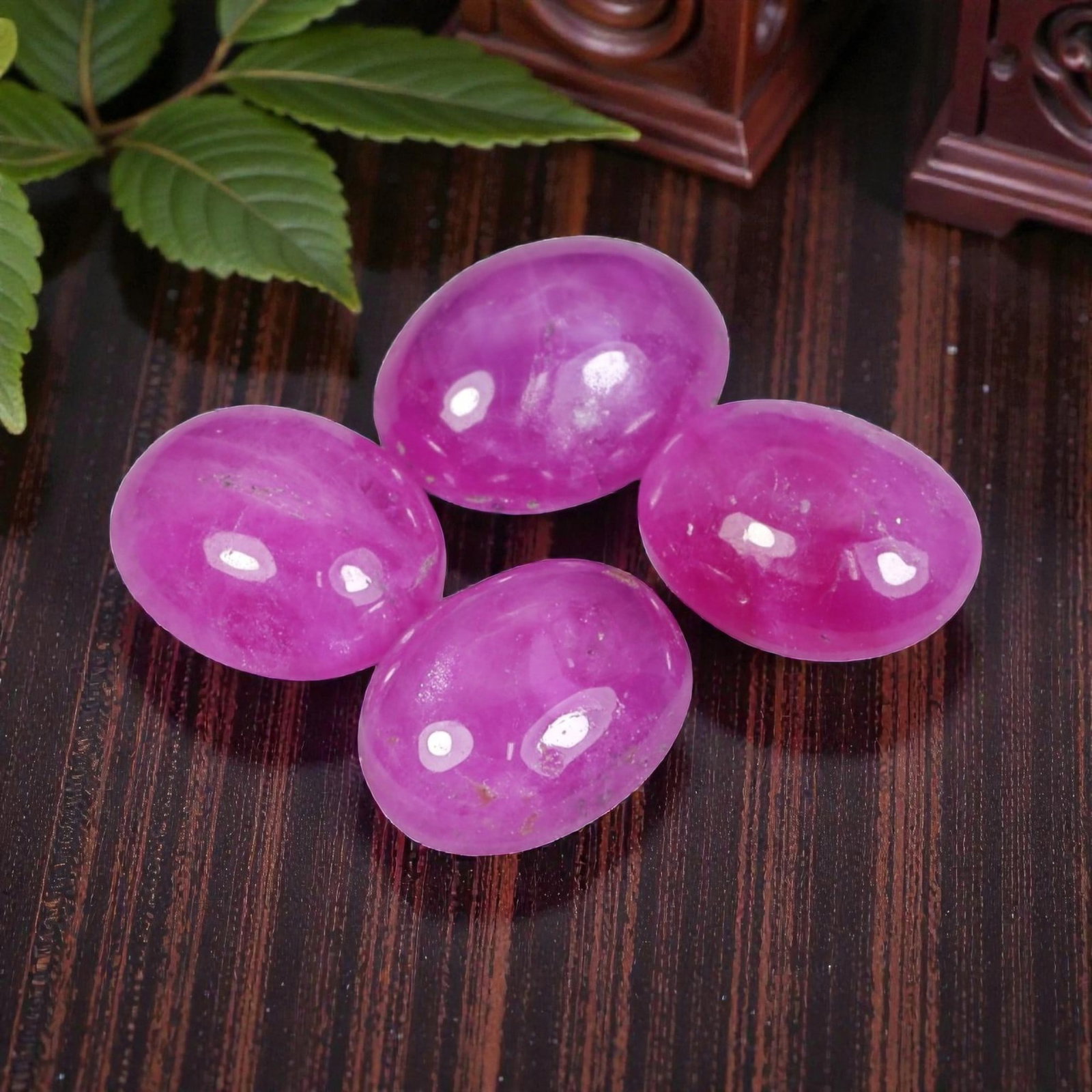 6.49 Carats Natural Ruby - Oval Cabochon Gemstone, 95WE: Oval cabochon-cut ruby gemstone, crafted from natural ruby material. The stone exhibits a vivid, saturated pinkish-magenta hue, with subtle natural inclusions and internal veining characteristic of un