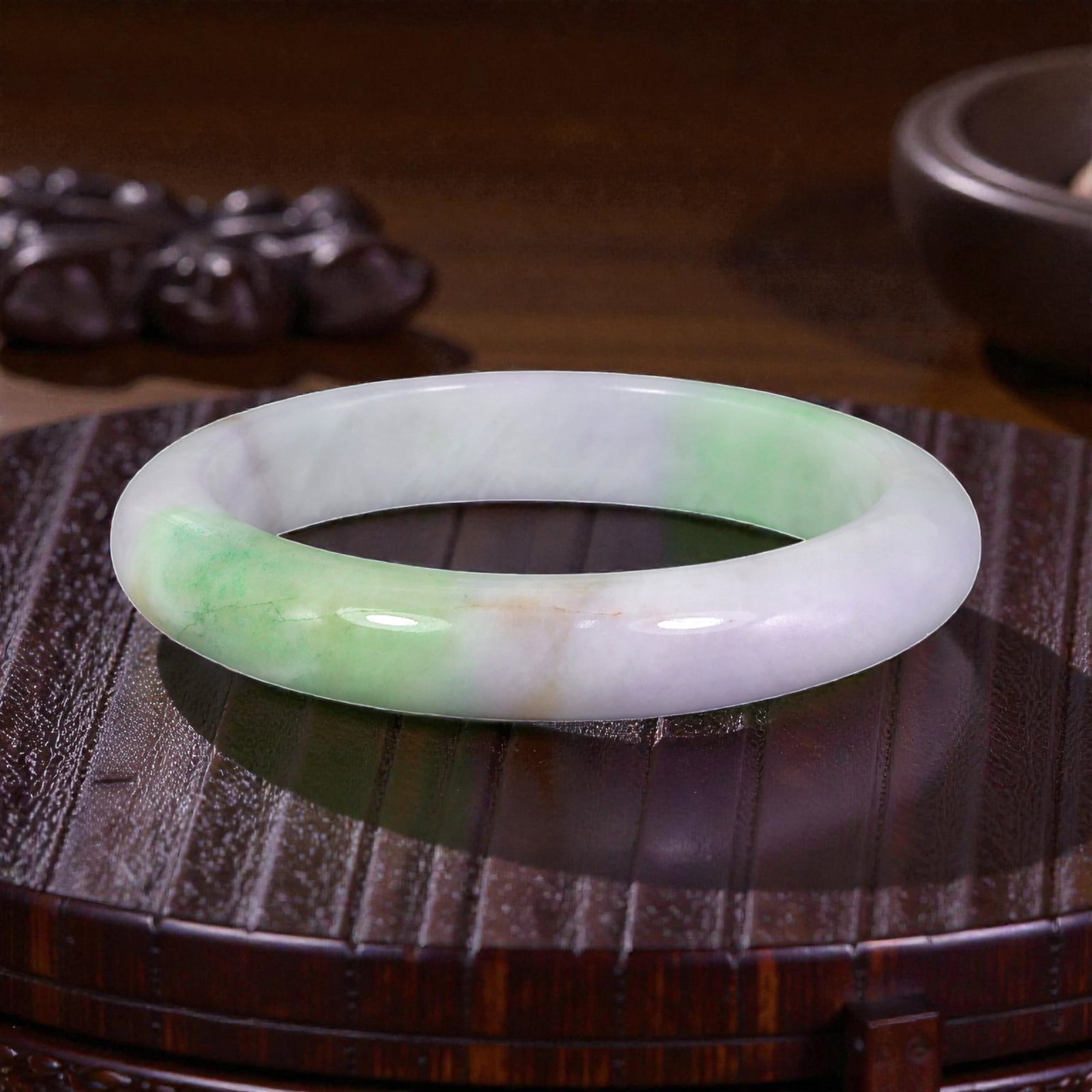 Natural Burmese Type A White & Green Jadeite Bangle - Pastel Gradient Bracelet, 91XE: This is a rounded, solid bangle crafted from natural Burmese Type A jadeite, displaying a creamy white base with soft pastel green gradients and subtle lavender undertones. The stone exhibits a smooth