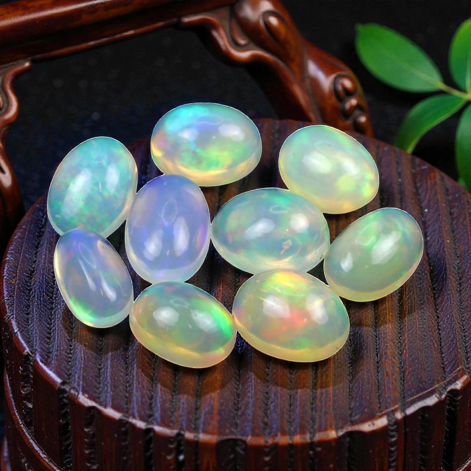 12.85 Carats Neon Play-of-Color Opal Selection - Natural Ethiopian Cabochons - 8 to 10 mm, 12XE: This luminous selection of opals radiates a dynamic spectrum of neon hues, with flashes of electric green, vivid orange, and spectral blue dancing across each dome. Their translucent base allows the i