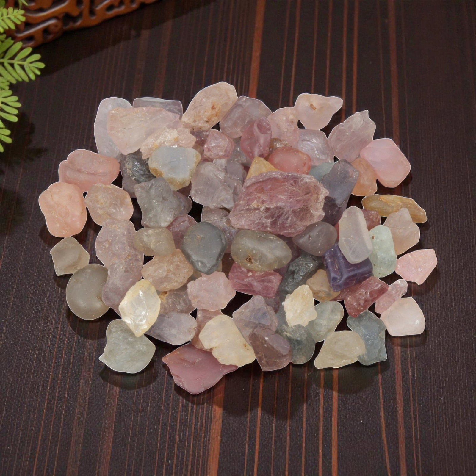 120.45 Carats Natural Multicolor Tourmaline Rough Parcel, 34XE: This beautiful parcel of natural tourmaline rough showcases a soft, varied palette of pastel hues, including delicate pinks, lavender, mint greens, blues, and warm peaches. The stones are in their nat