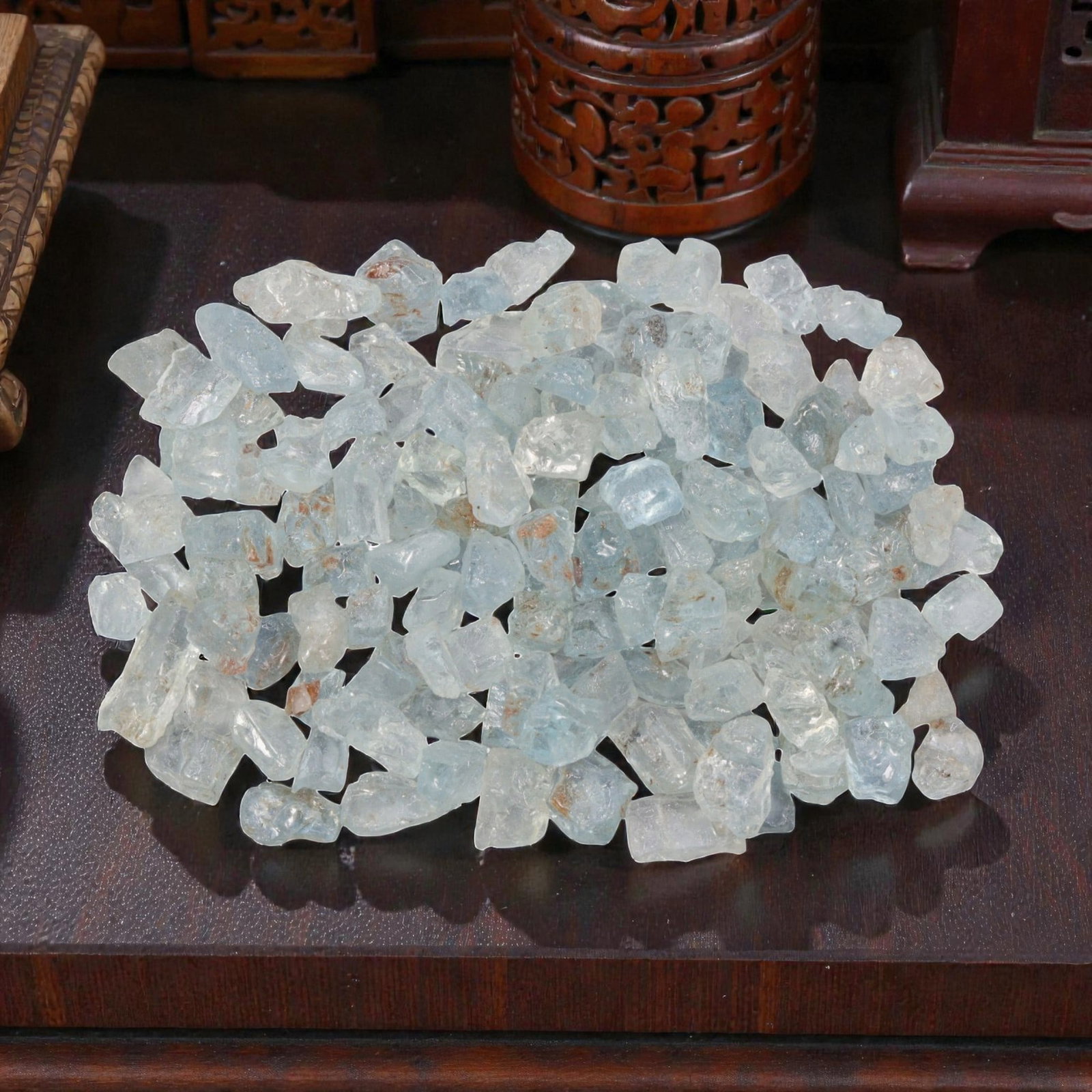 128.98 Carats Natural Aquamarine Rough Parcel, 42XE: This luminous parcel of natural aquamarine rough showcases the classic soft sky-blue hue the gem is known for, ranging from pale, translucent tones to deeper, more saturated blues. The stones are in t