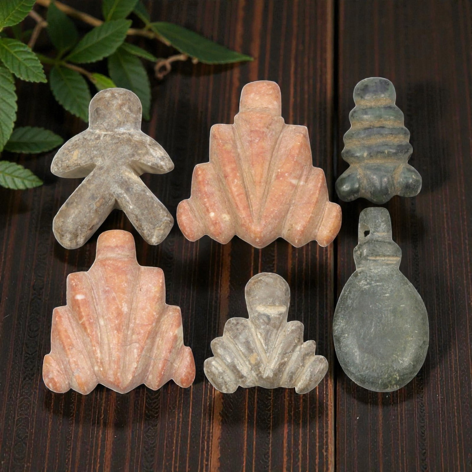 Lot of 6 Ancient Coptic Egyptian Multi-Stone Amulets, Circa Roman to Coptic Era, 71WT: Carved from a variety of stones in earthy tones-including light brown, pinkish-orange, and dark green-the group consists of six distinct amulets, ranging in size from 2 cm to 3 cm (0.79-1.18 in.). The