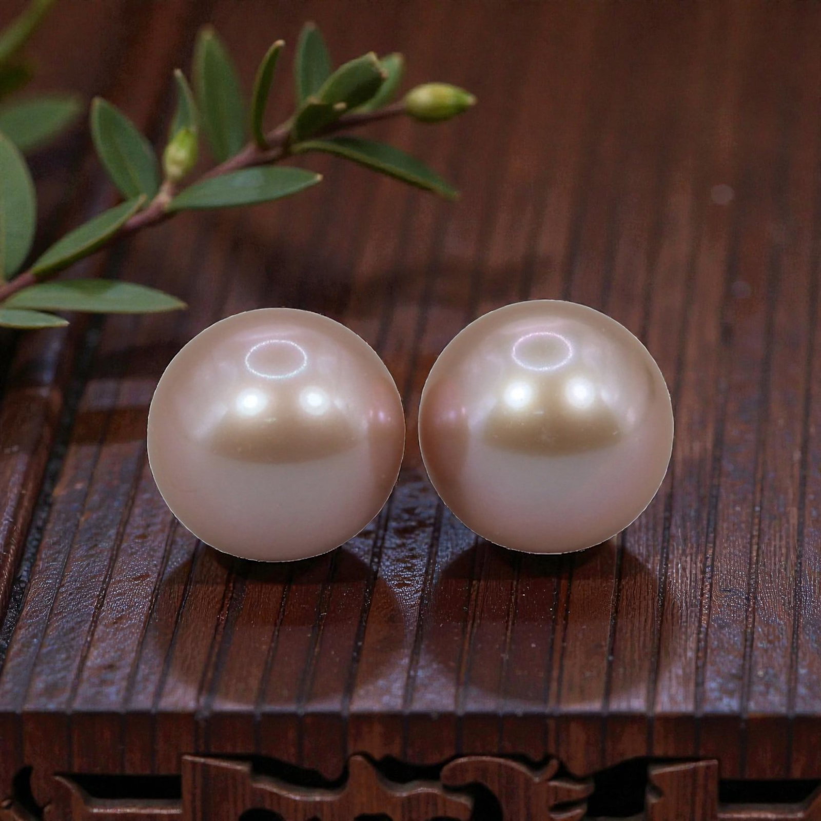 Freshwater Pearl Pair - Natural Pearl Pink Round Gemstones 7.6mm, 39XA: A matched pair of natural freshwater pearls, exhibiting a soft pinkish-peach hue with bright, even luster and subtle iridescent orient. The pearls are near-spherical, with smooth nacre and only minor 