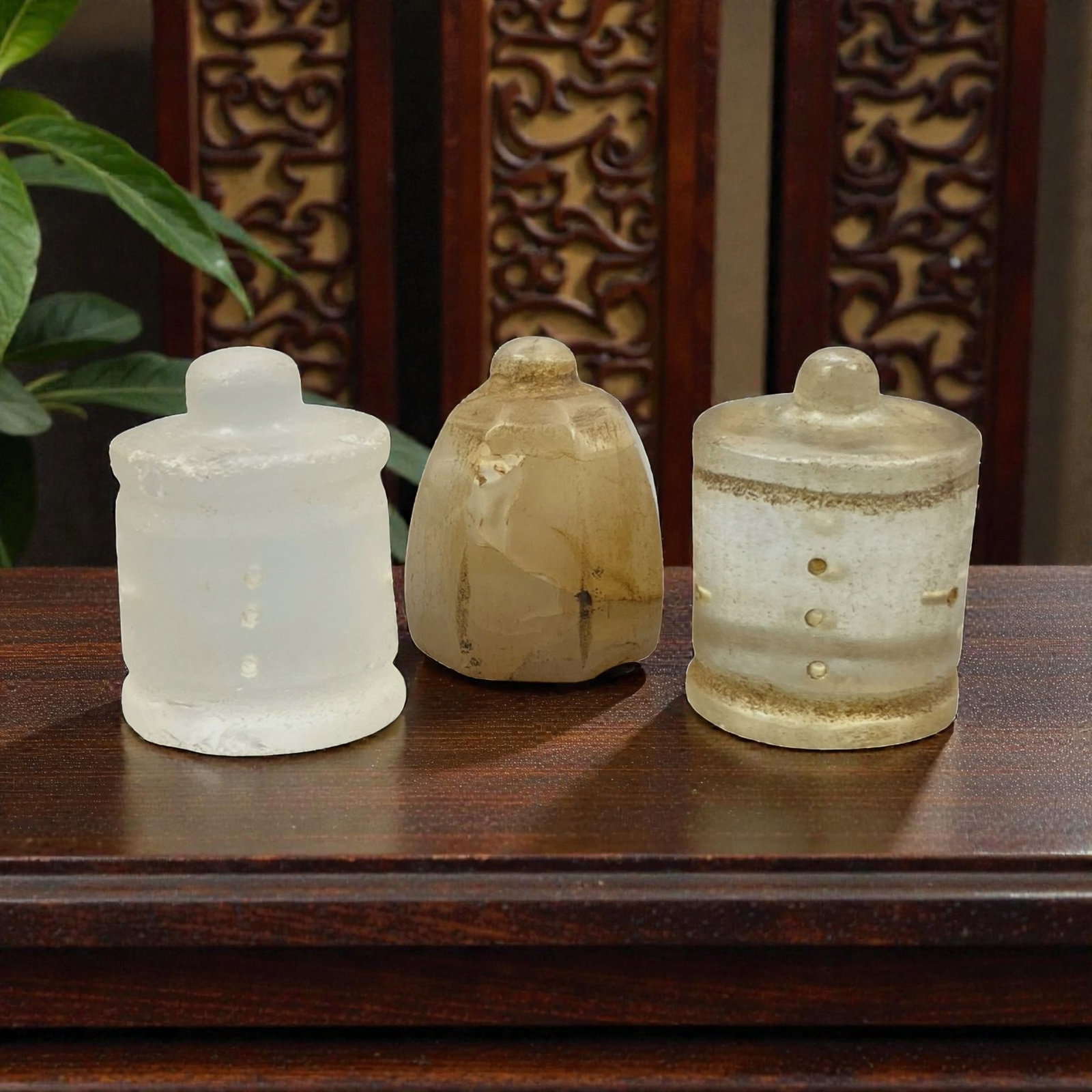 Lot of 3 Ancient Glass Relic Finials, 42WK: The lot comprises three glass relics of varying forms: two cylindrical examples and one bell-shaped form, all topped with small knobs. The translucent glass ranges from clear to pale amber tones, exhi