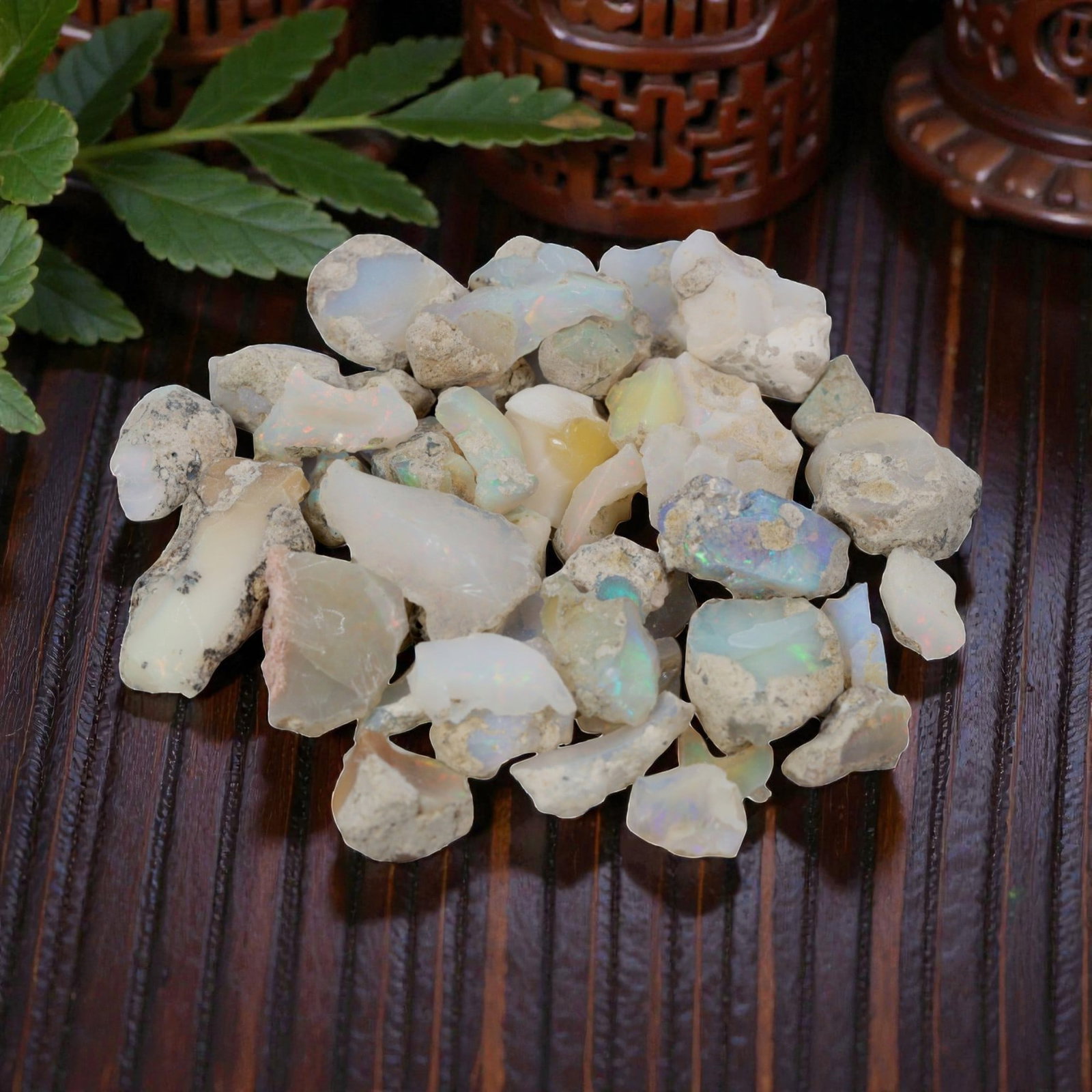 Ethiopian Welo Opal Rough - Natural Unpolished Gemstone Lot, 15WS: A collection of natural Ethiopian Welo opal rough pieces, ranging in size from 1-3 cm and totaling 49.42 grams. The opals display characteristic milky to translucent base tones with vibrant, shifting 
