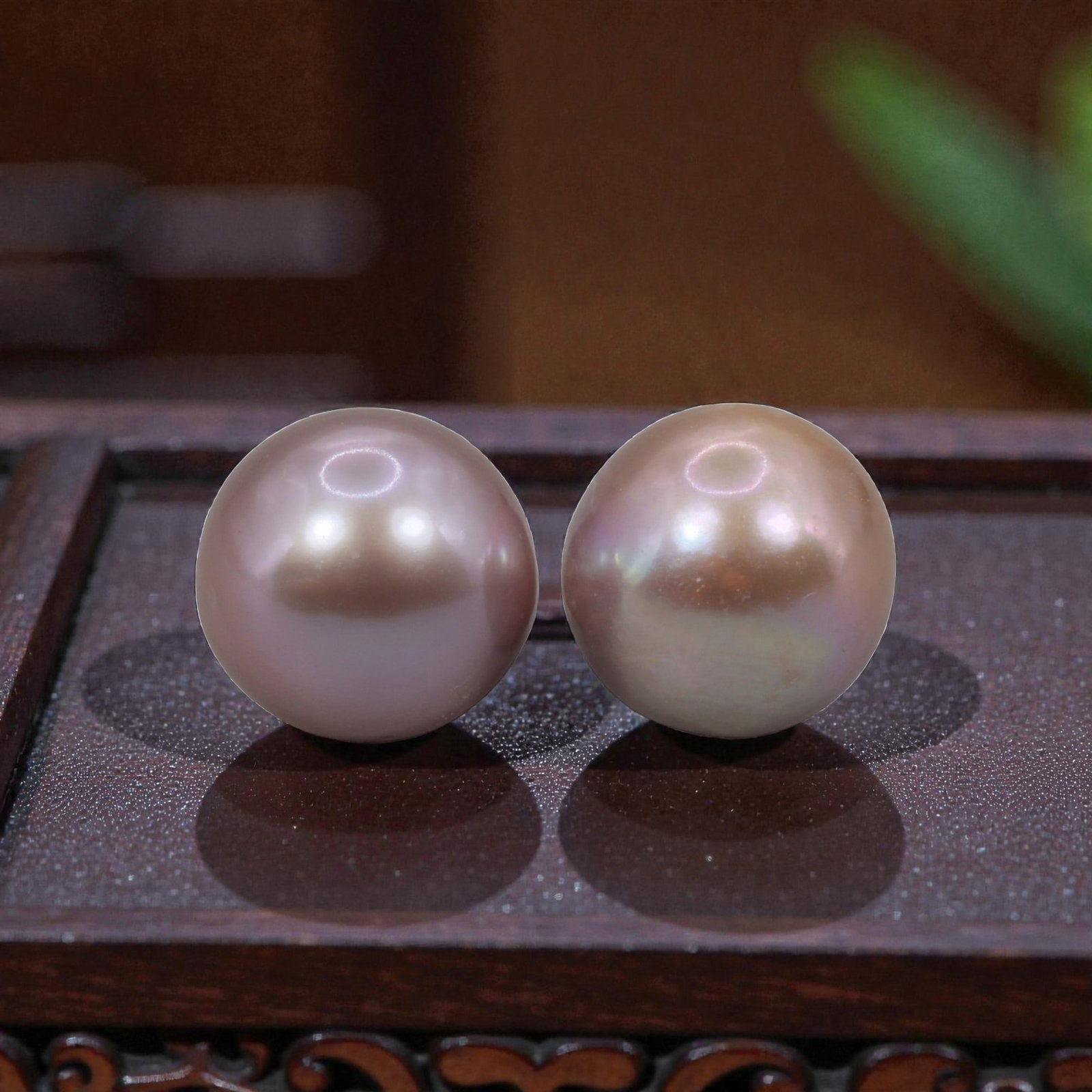 Freshwater Pearl Pair - Natural Pearl Lavender Round Gemstones 10.8mm, 33XA: A matched pair of natural freshwater pearls, displaying a rich lavender-pink body tone with fine, iridescent luster and visible orient. The pearls are near-spherical, with smooth nacre and minor natur