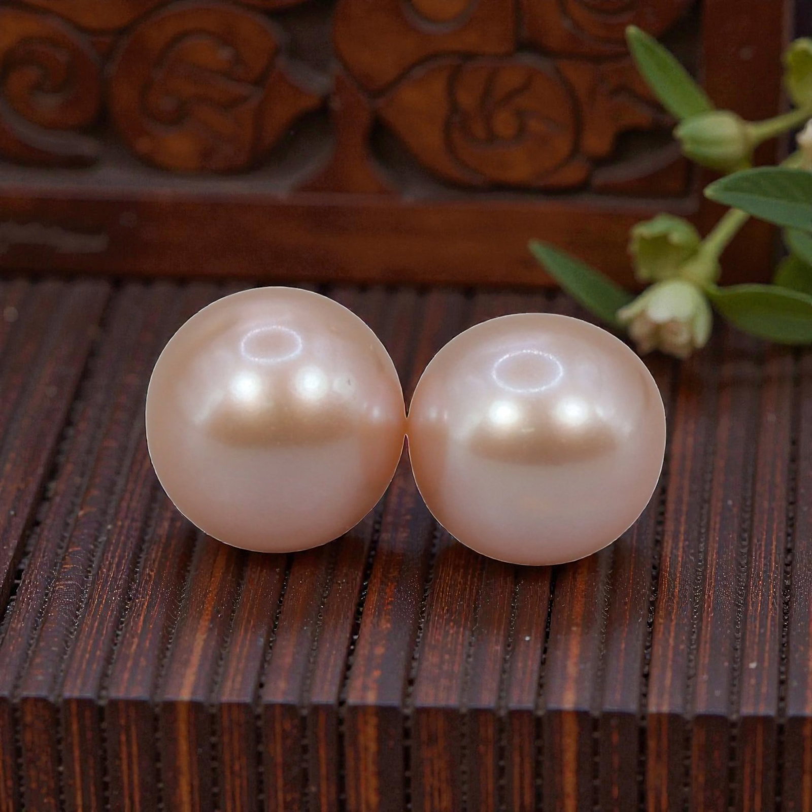 Freshwater Pearl Pair - Natural Pearl Peach Round Gemstones 7.1mm, 28XA: A matched pair of natural freshwater pearls, exhibiting a soft peach-pink hue with bright, even luster and subtle iridescent orient. The pearls are near-spherical, with smooth nacre and minor natural 
