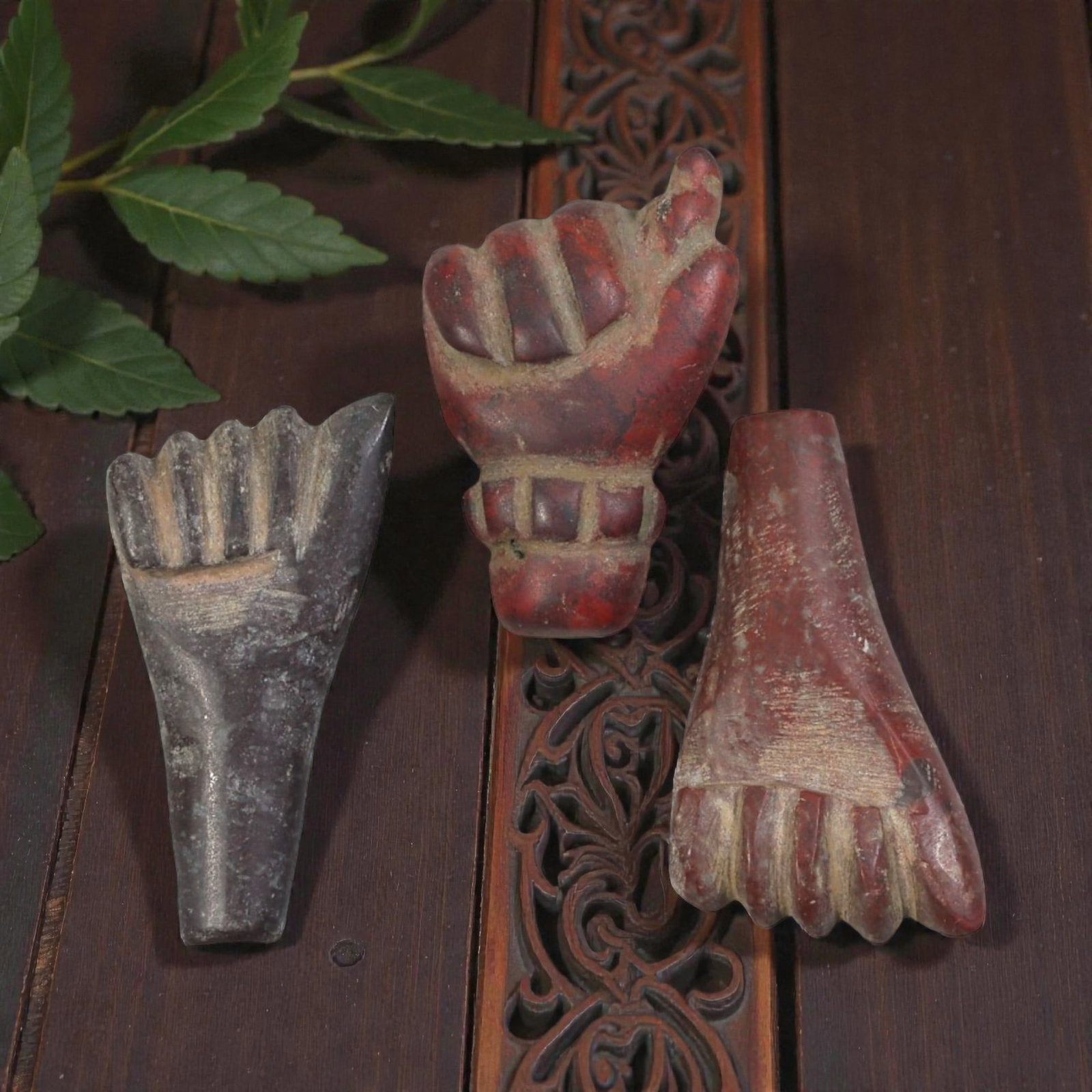 Lot of 3 Ancient Egyptian Stone Fist/Hand Amulets, Circa Late Period to Coptic Era, 44AE: The group comprises three carved stone amulets depicting hands or fists, characteristic of Egyptian protective iconography from the Late Period through the Coptic era. The pieces are worked in varied 
