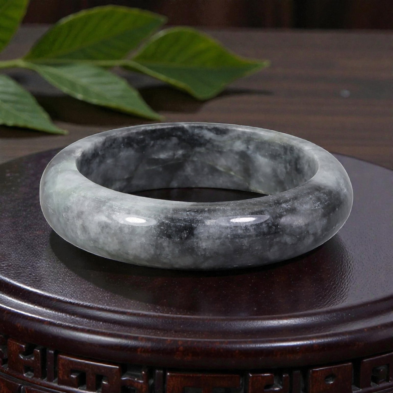 Natural Burmese Type A Black & White Jadeite Bangle - Smoky Ink Wash Bracelet, 26EA: This is a wide, solid bangle crafted from natural Burmese Type A jadeite, displaying a dramatic smoky black and white ink-wash pattern throughout the polished stone. The surface exhibits a smooth, glo