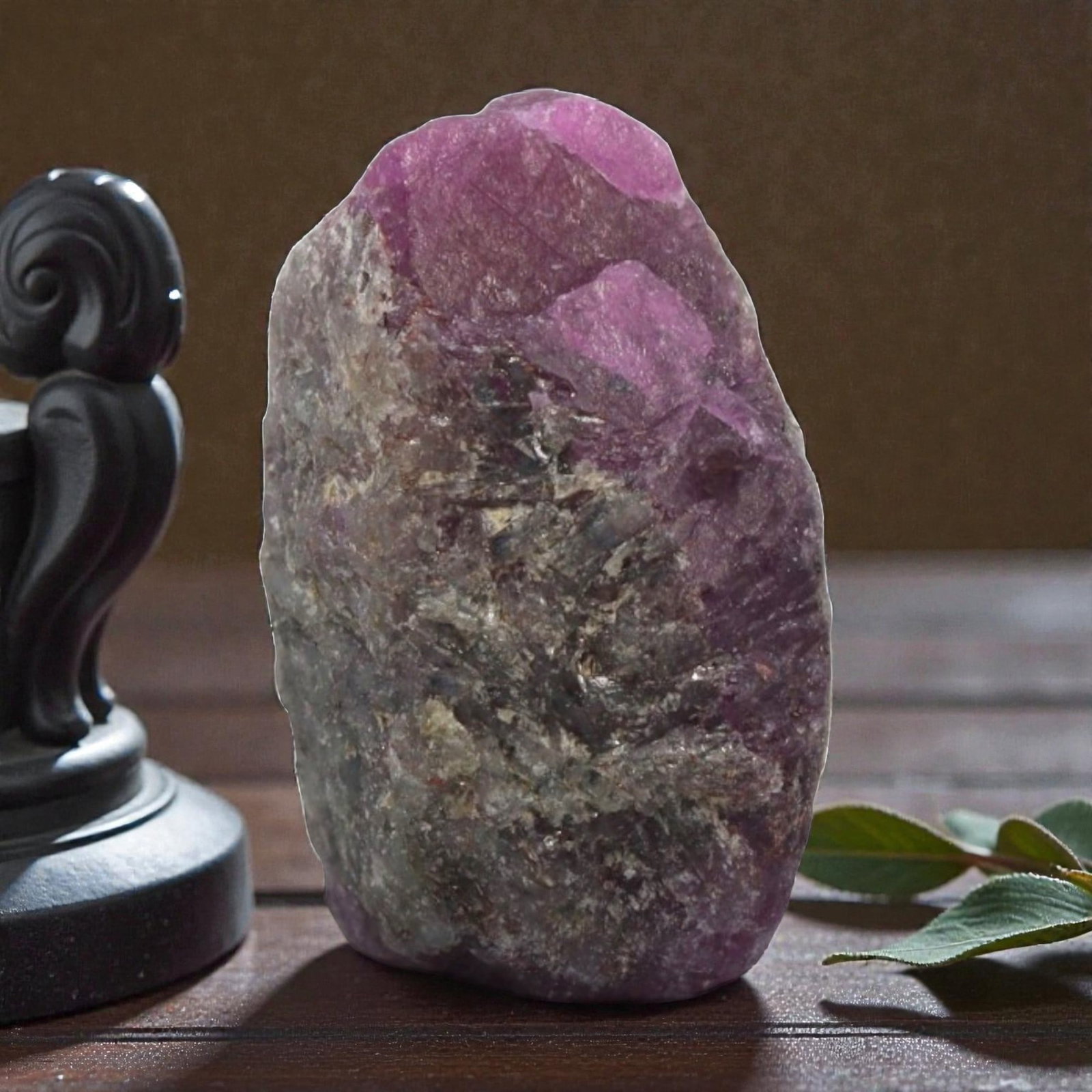 24.70ct Natural Mauritania Ruby Rough (Unheated), 85XA: This unheated Mauritania ruby rough is a striking natural crystal specimen, featuring a rich, saturated magenta hue with subtle purple undertones that deepen toward the core. The rough's rugged, natur