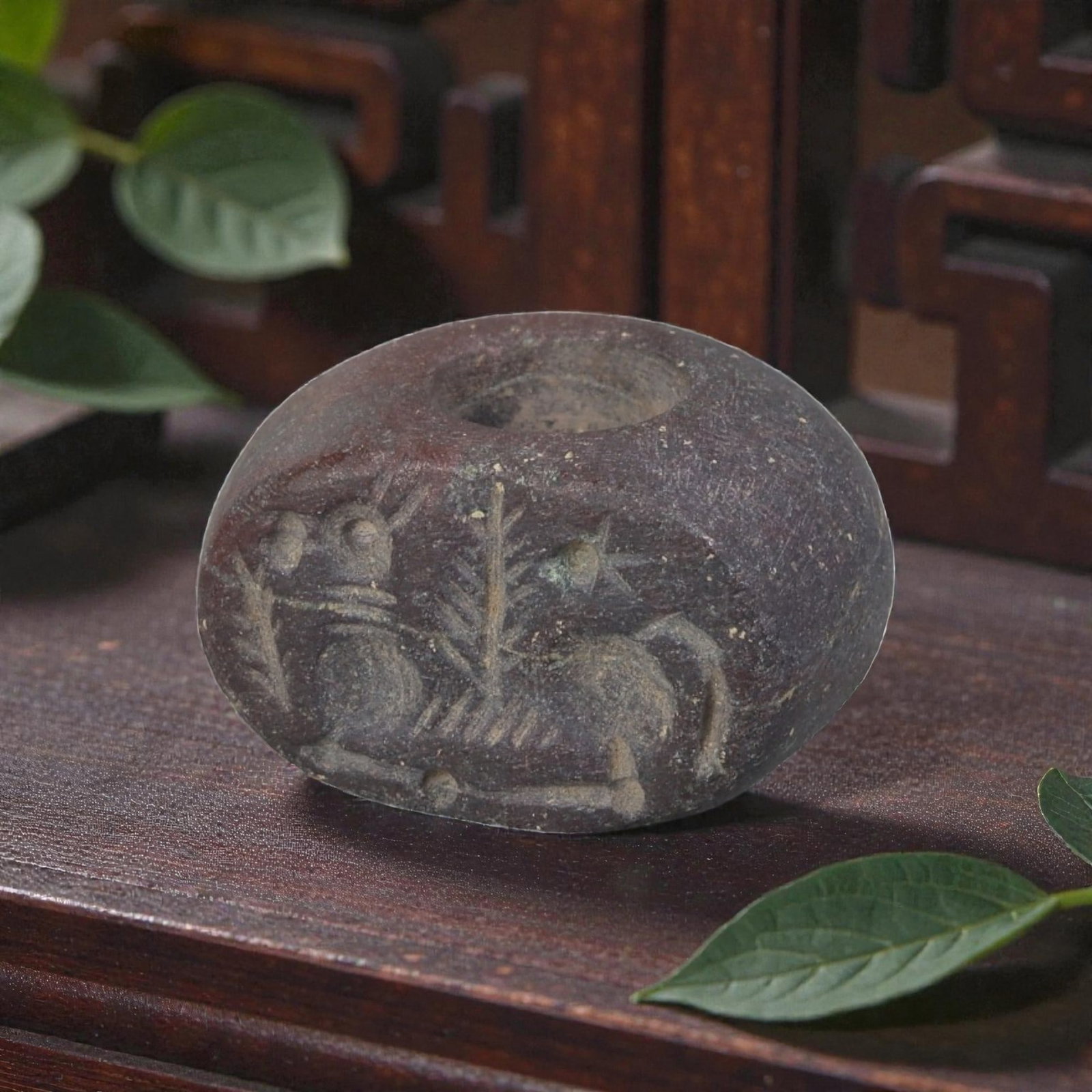 Ancient Sasanian Jasper Stag with Plant and Star Motif Stamp Seal, 22AP: Crafted from dark, weathered jasper with natural granular texture and earthy patina, this ancient Sasanian stamp seal features a deeply incised zoomorphic motif of a stylized stag in profile. The scen