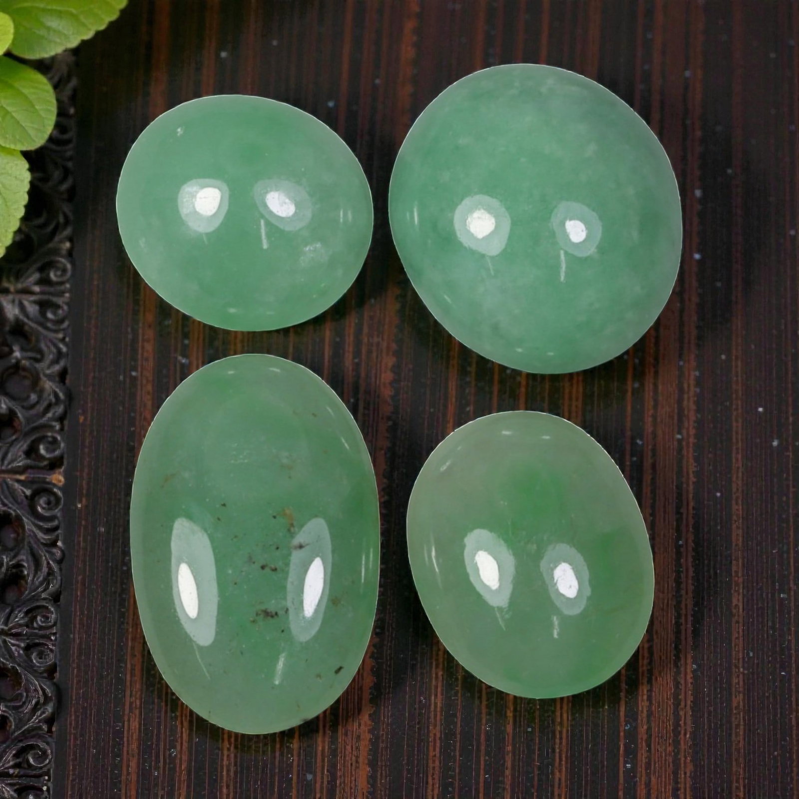 33.53ct 4 Pcs Natural Burmese Type A Jadeite Jade Cabochon Gemstones, 31AN: This set includes 4 natural Type A Burmese jadeite jade cabochons, with a total carat weight of 33.53ct. The largest cabochon measures 18.48x11.7x4.45mm. Each stone features a smooth, polished cabocho