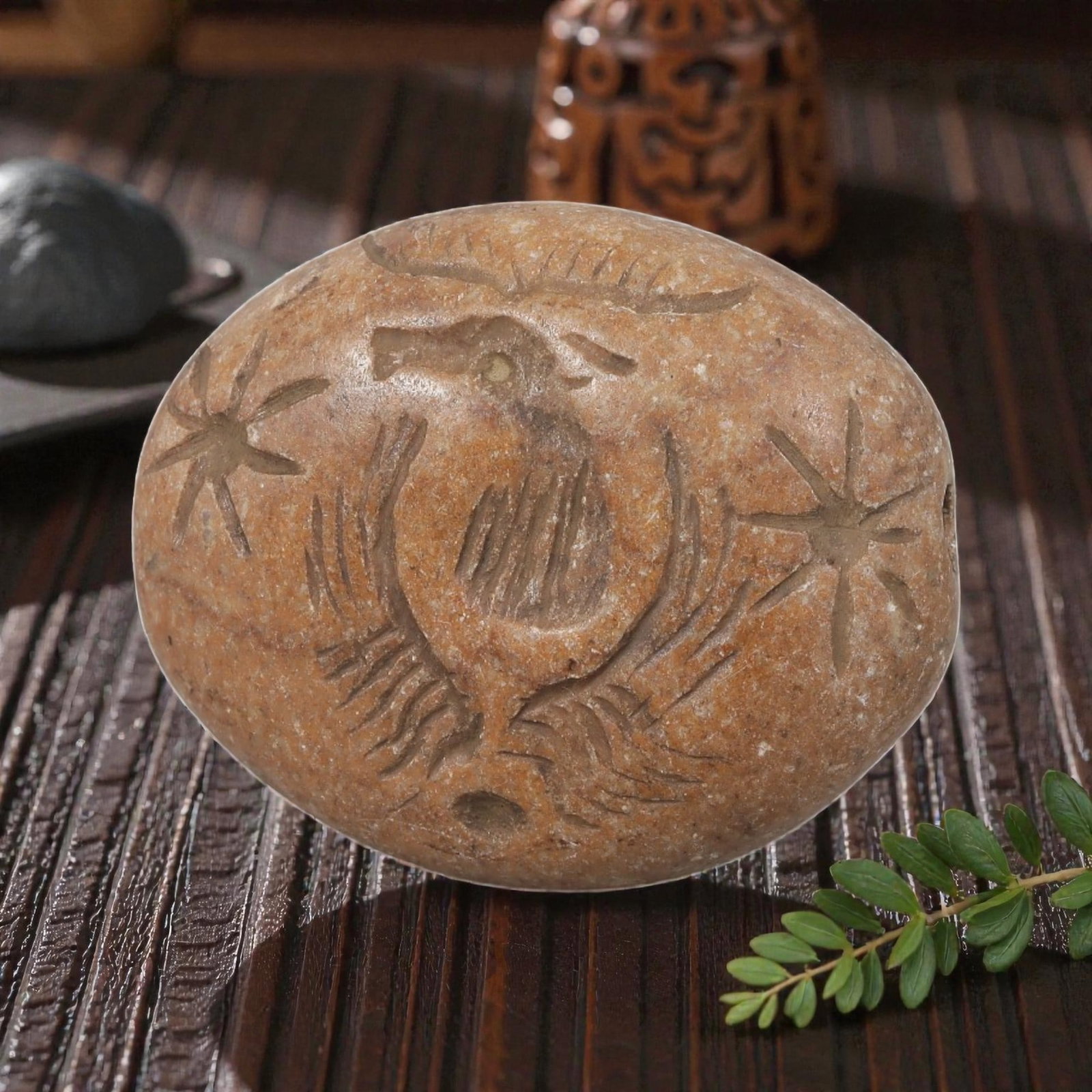 Antique Islamic Carved Stone Stamp Seal Bead, 49YD: This ancient stamp seal bead is carved from smooth, warm-toned stone, shaped into an oval form with a perforation through the side for suspension. The face features an engraved intaglio depicting a st